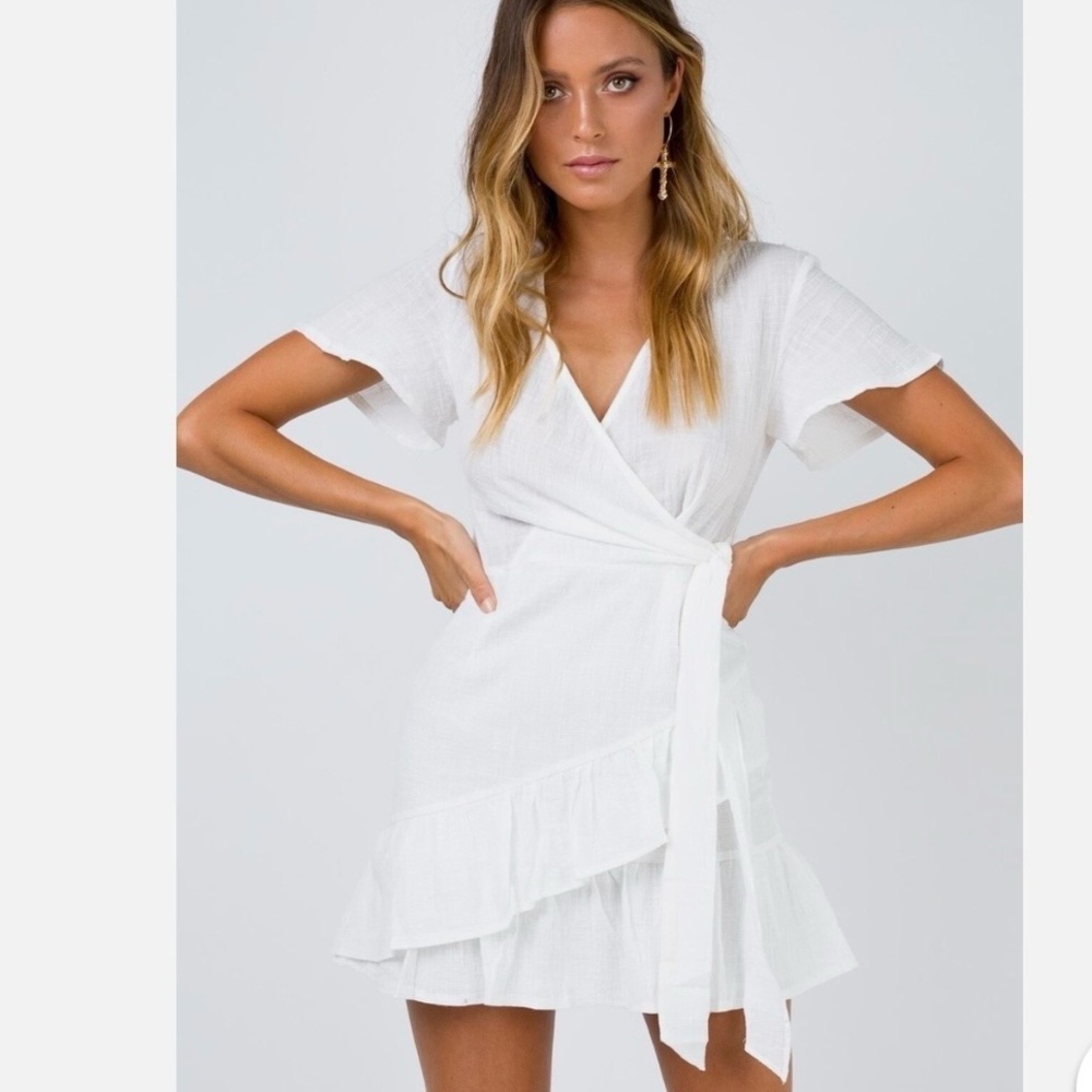 Princess Polly White Wrap Ruffle Mini Dress Size 10 NWT Ruffle Hem Short Sleeve